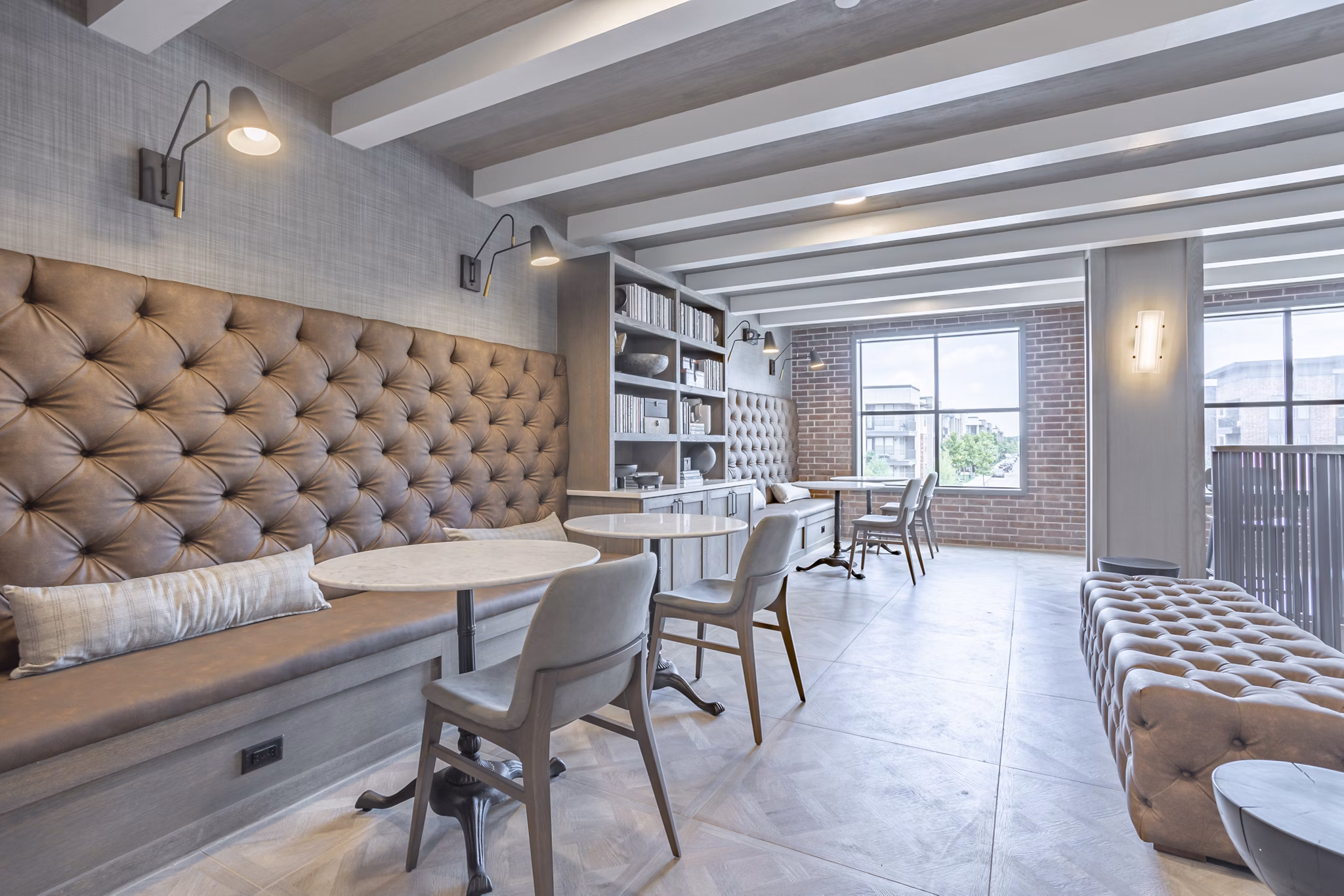 Clubhouse featuring modern decor and communal seating at Filament Apartments