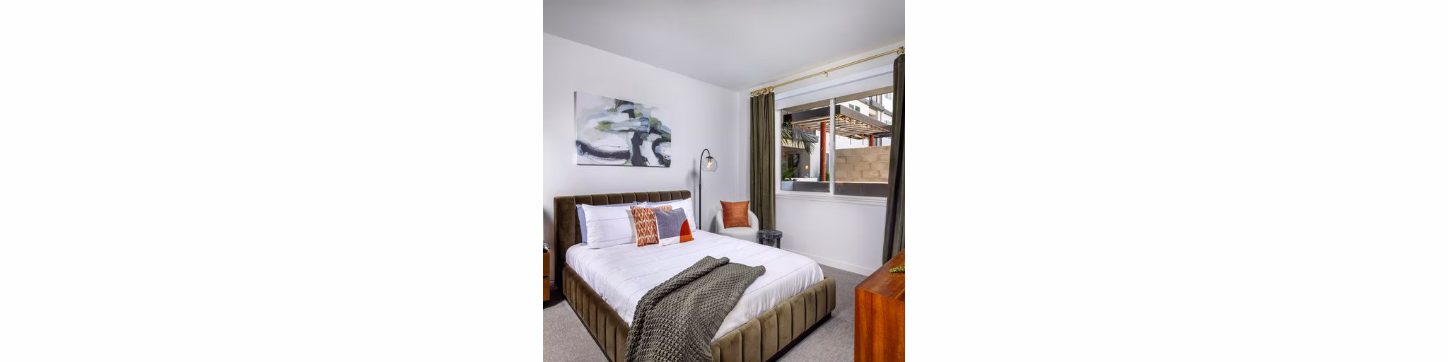 Modern bedroom with elegant decor at Paloma Apartments