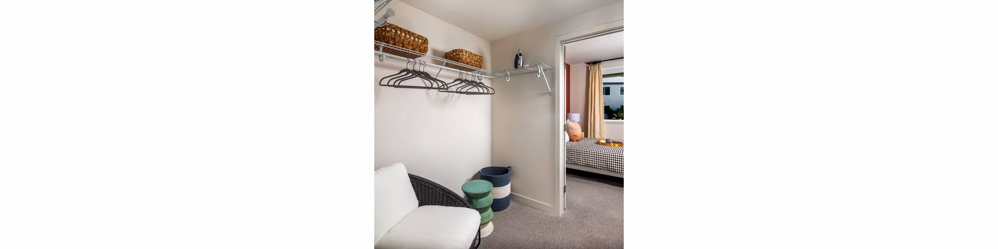 Spacious closet with built-in shelving in Paloma Apartments