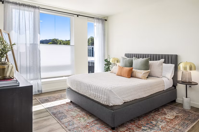 Stylish bedroom with contemporary decor at Broadstone Strata Apartments