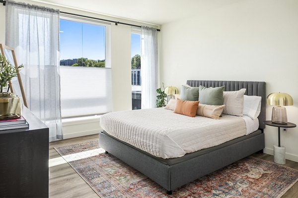 Stylish bedroom with contemporary decor at Broadstone Strata Apartments