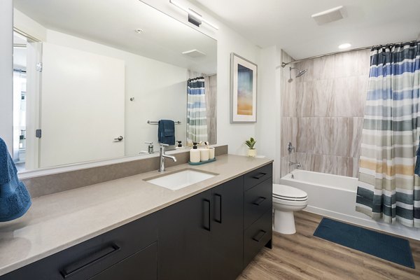 Bathroom featuring sleek modern design at Broadstone Strata Apartments