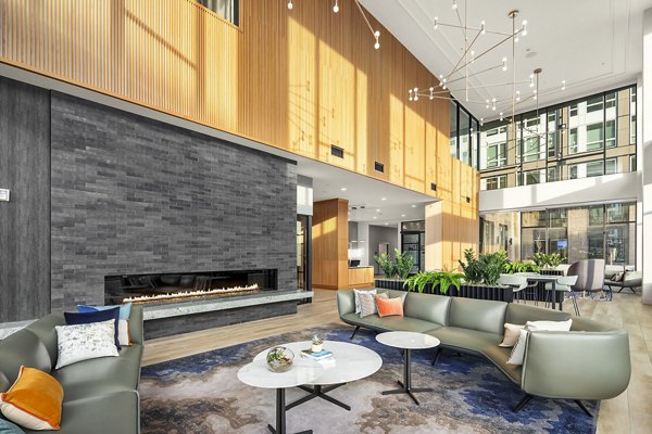 Elegant clubhouse with modern decor at Broadstone Strata Apartments, perfect for social gatherings and community events