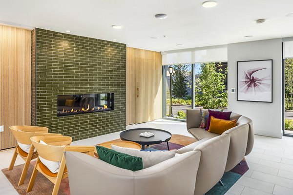 Elegant clubhouse with modern furnishings at Broadstone Strata Apartments, offering luxury social and entertainment spaces