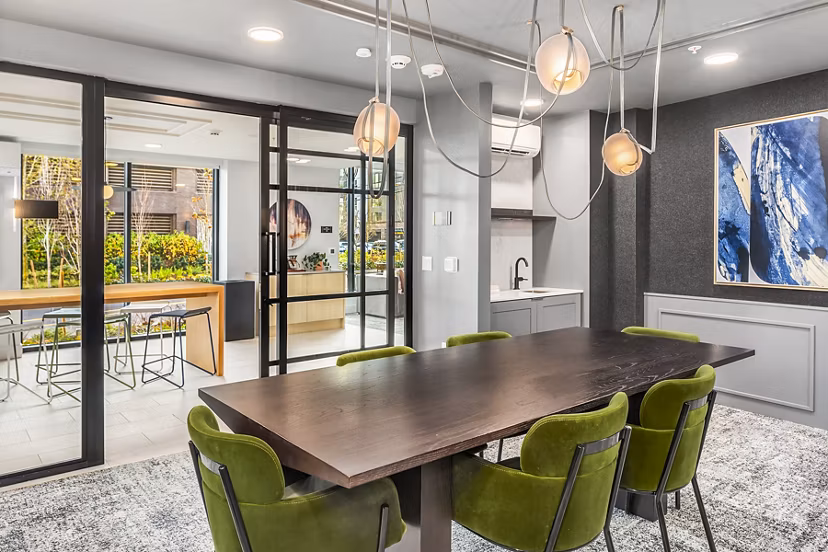 Modern clubhouse meeting facility with sleek design at Broadstone Strata Apartments, ideal for gatherings and community events