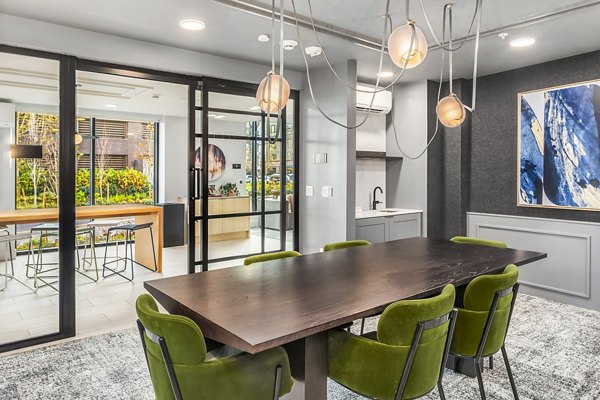 Modern clubhouse meeting facility with sleek design at Broadstone Strata Apartments, ideal for gatherings and community events