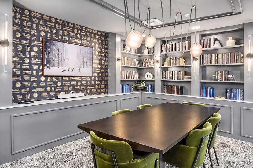 Clubhouse meeting facility and library with modern design at Broadstone Strata Apartments Ideal for community gatherings and study sessions