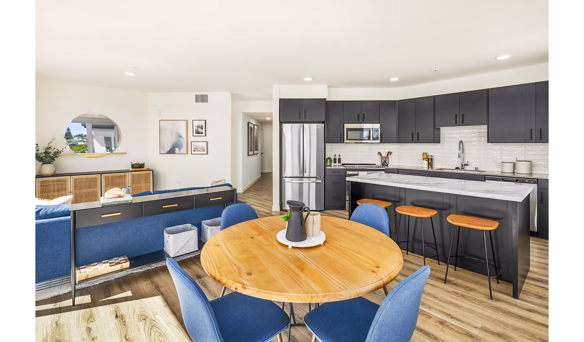 Dining area with modern decor and elegant lighting at Broadstone Strata Apartments