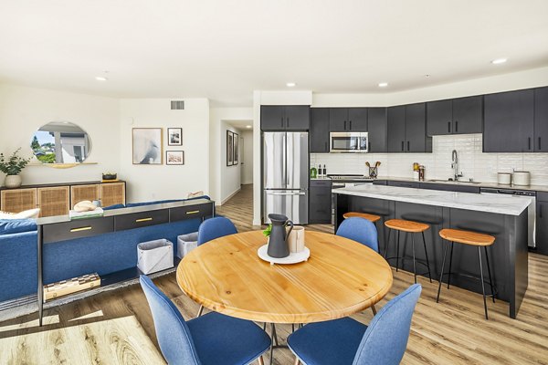 Dining area with modern decor and elegant lighting at Broadstone Strata Apartments