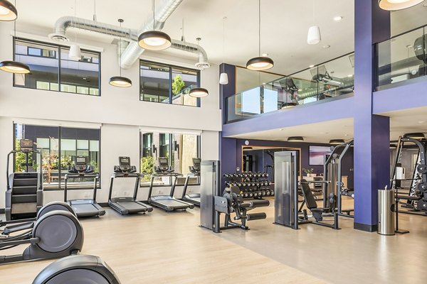 State-of-the-art fitness center with modern equipment at Broadstone Strata Apartments