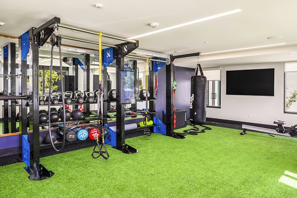 Well-equipped fitness center with modern machines at Broadstone Strata Apartments