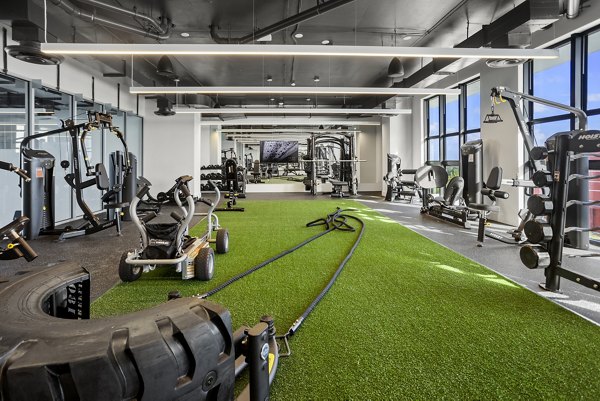 fitness center at Grove Central Residences Apartments