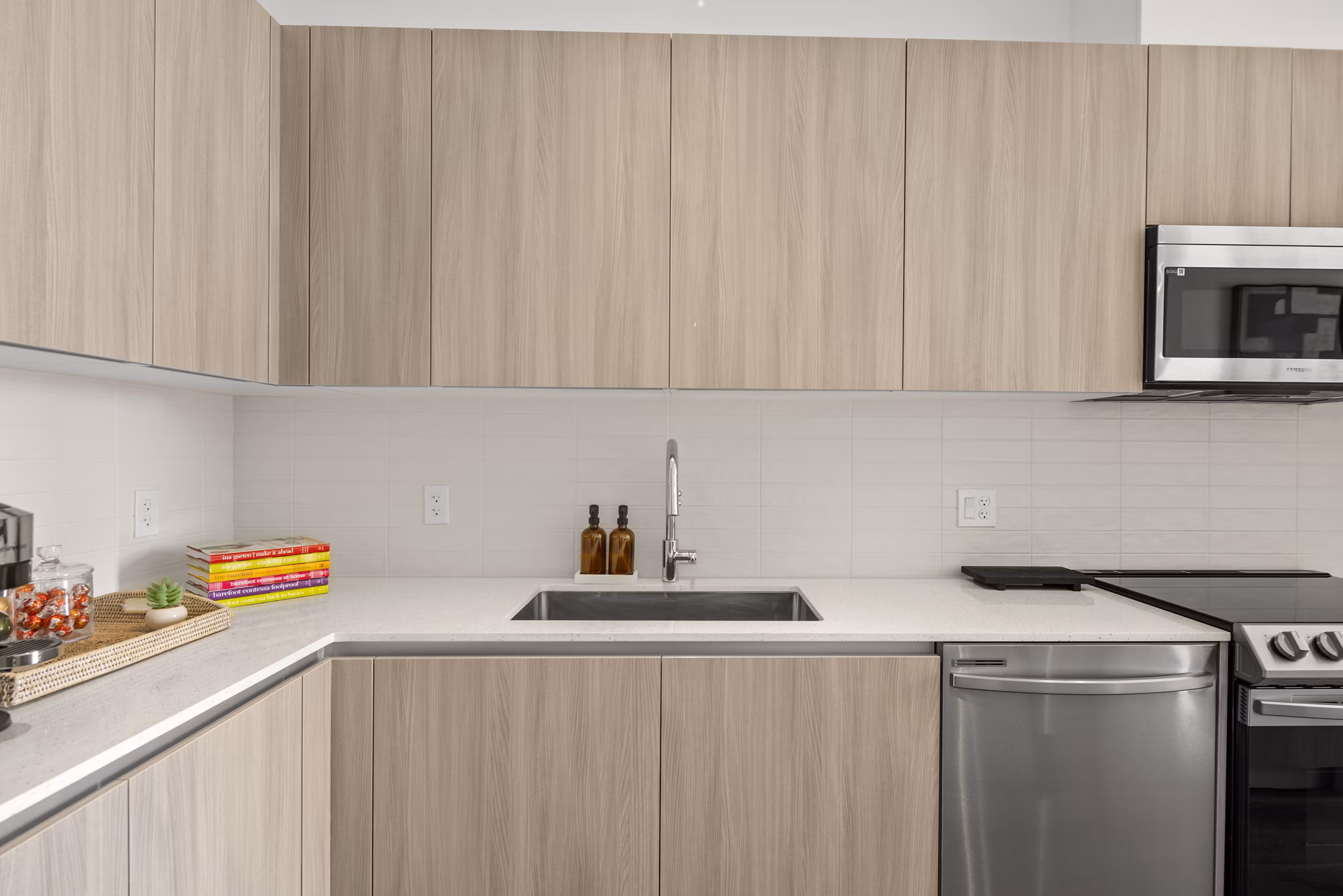 Modern kitchen featuring sleek countertops and stainless steel appliances at Aventura Bellevue Apartments