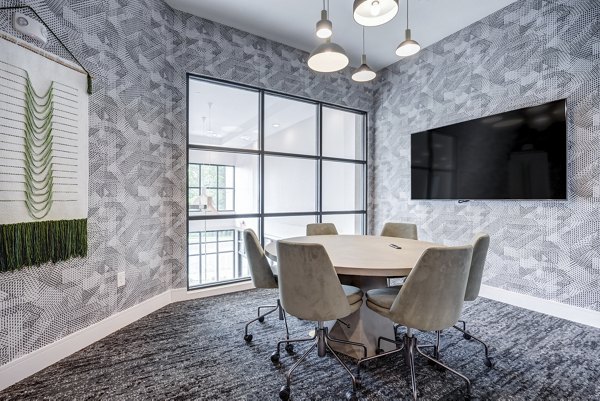 Meeting room for collaborative sessions at Prospect Apartments, featuring modern design and technology for efficient gatherings