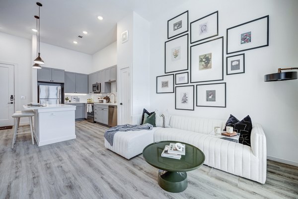 Spacious living room with modern decor and natural light at Prospect Apartments luxury apartments