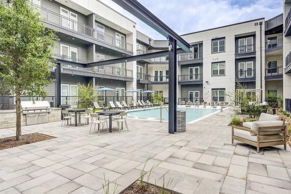 Chic outdoor courtyard with comfortable seating at Prospect Apartments