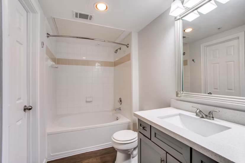 Modern bathroom with sleek fixtures at Oak Crest Apartments in a luxury Greystar-managed property