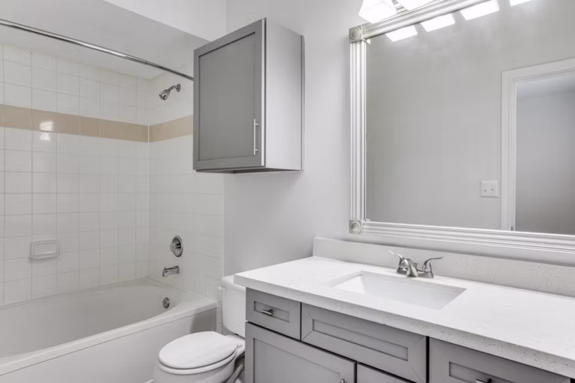 Bathroom featuring sleek fixtures and modern design at Oak Crest Apartments, a Greystar luxury residence