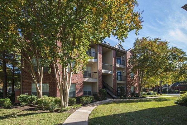 Woodland Park Apartments: Elegant high-rise building nestled in a serene area
