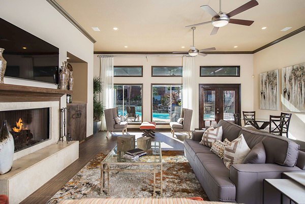 Spacious clubhouse with modern decor at Woodland Park Apartments