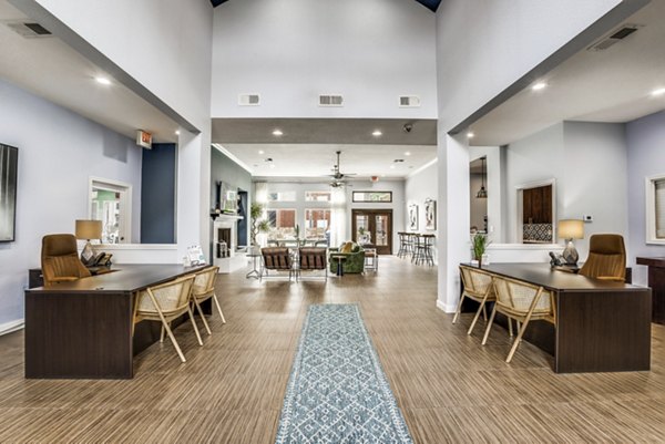Elegant clubhouse with modern design at Woodland Park Apartments luxury community