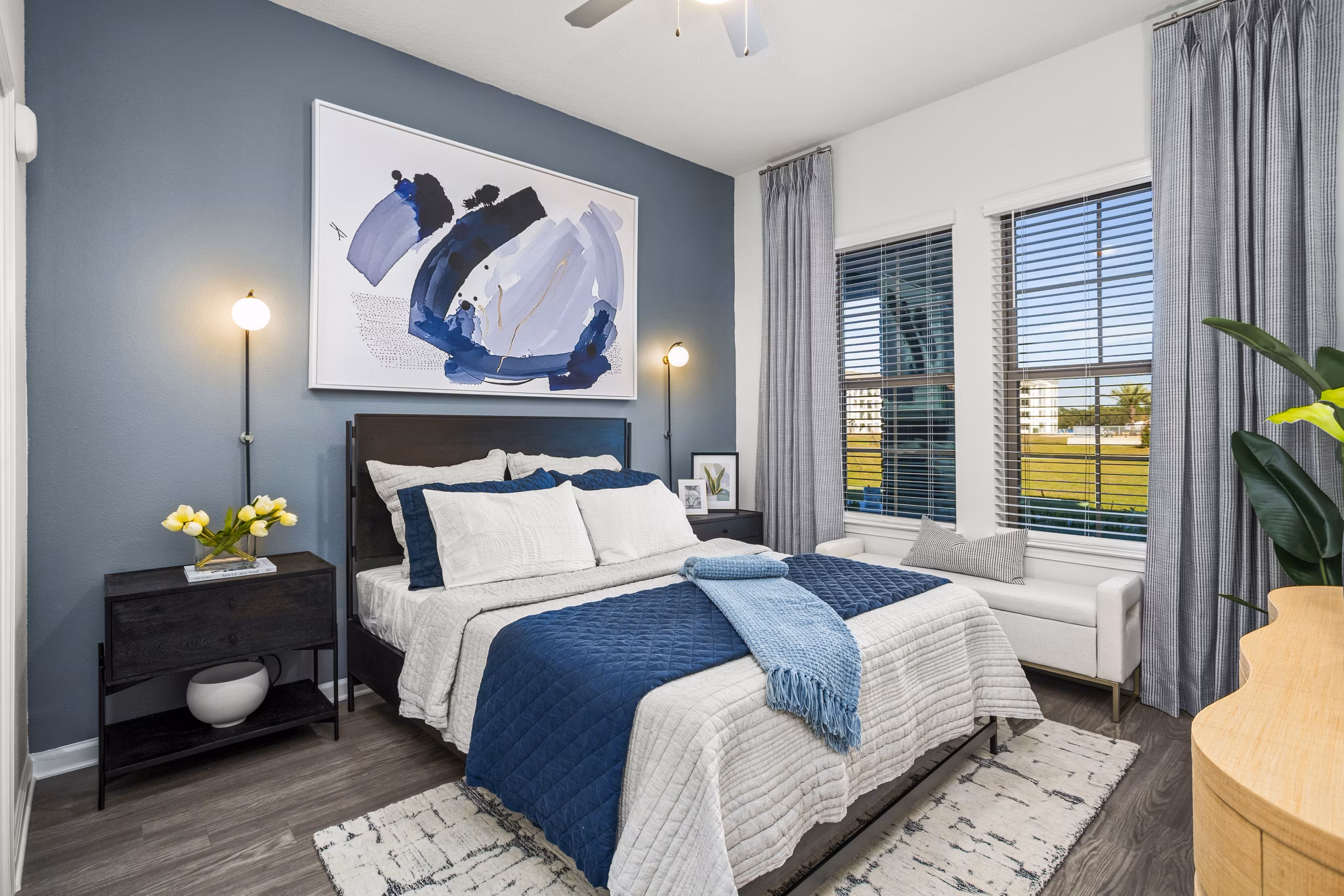 Sanctuary at Daytona Apartments: Elegant bedroom with plush furnishings and serene decor