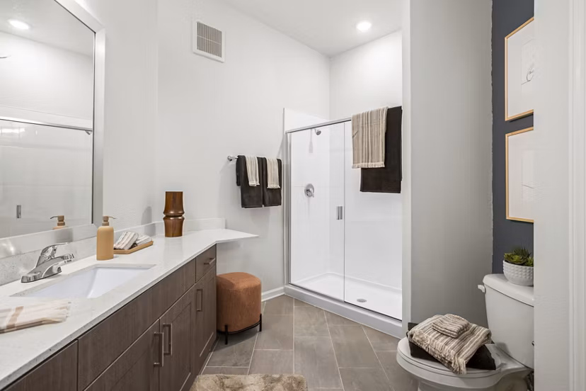 Bathroom with modern fixtures at Sanctuary at Daytona Apartments, a Greystar luxury property, highlighting sleek design and comfort in Daytona Beach