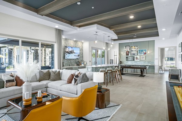 Stylish clubhouse lobby with modern decor at Sanctuary at Daytona Apartments, perfect for relaxing and socializing