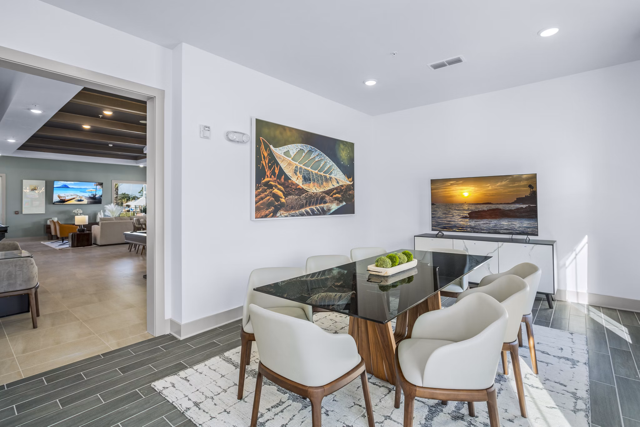 Clubhouse meeting facility with modern furnishings at Sanctuary at Daytona Apartments