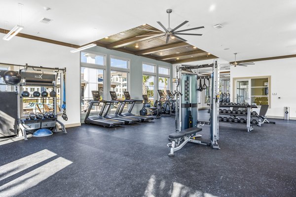 Modern fitness center with state-of-the-art equipment at Sanctuary at Daytona Apartments