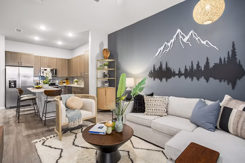Spacious living room featuring modern decor at Sanctuary at Daytona Apartments