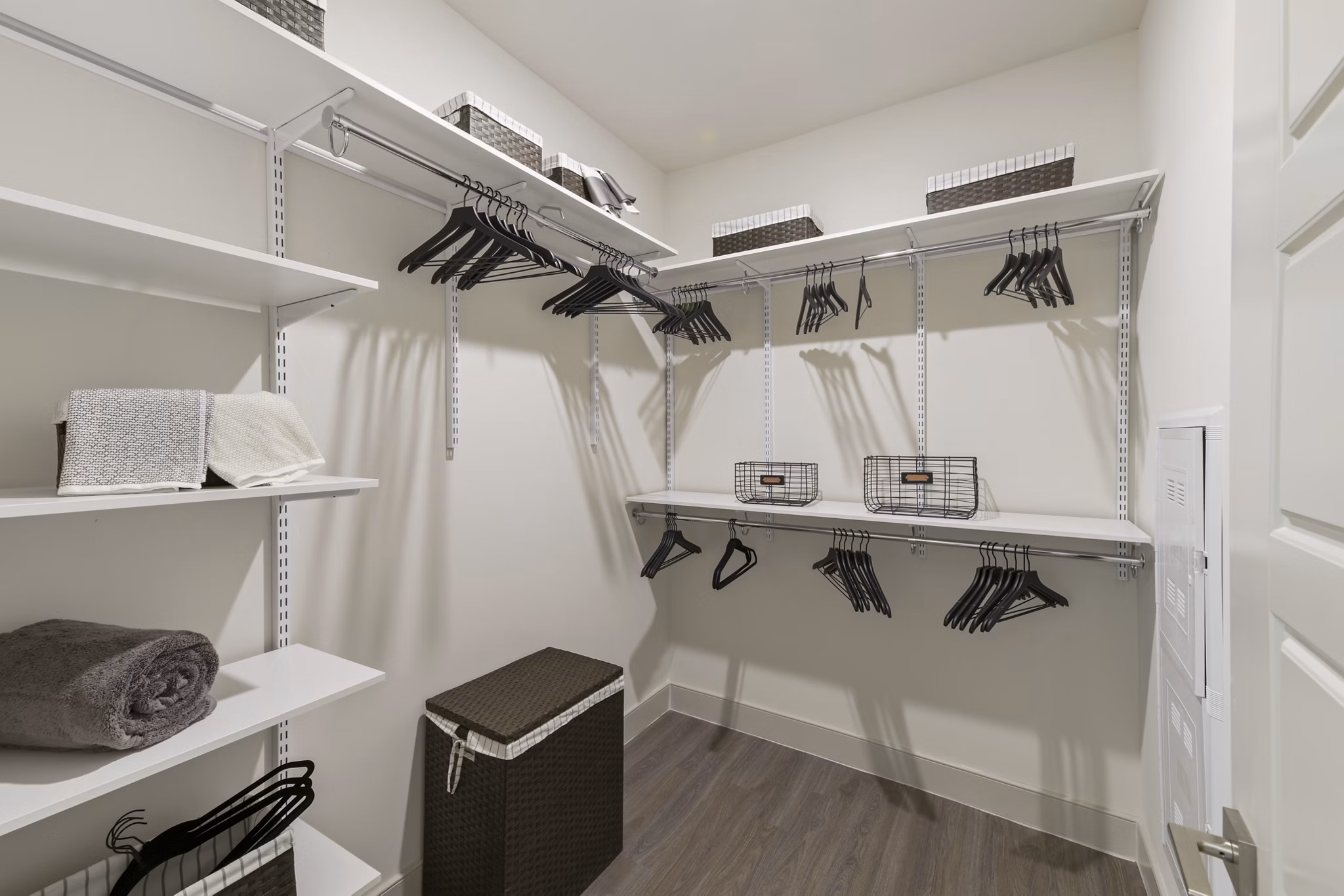 Closet space with custom shelving at The Ian Apartments