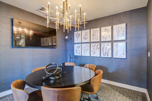 Meeting facility with modern amenities at The Ian Apartments, ideal for conferences and events in a luxury setting