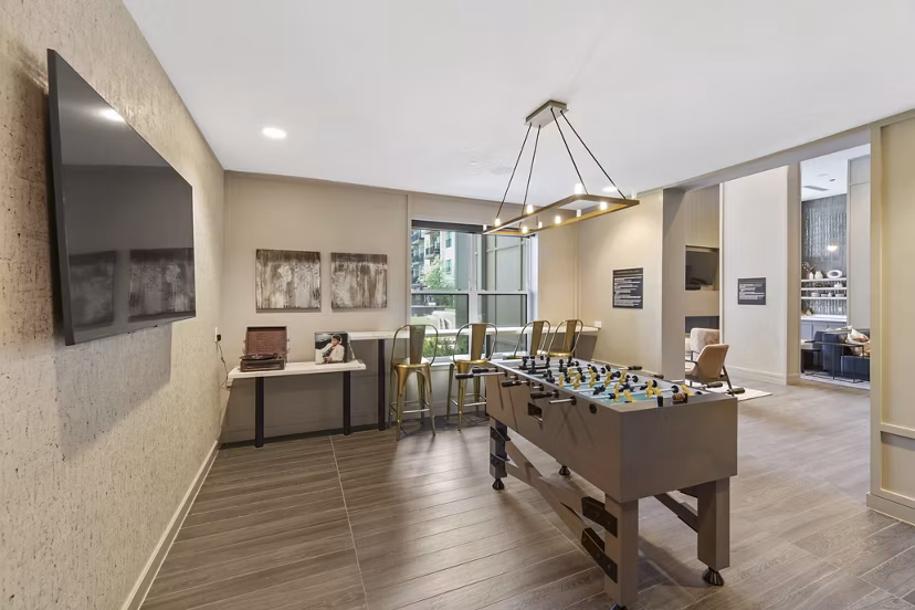 Elegant clubhouse with modern furnishings at The Ian Apartments, a Greystar luxury community