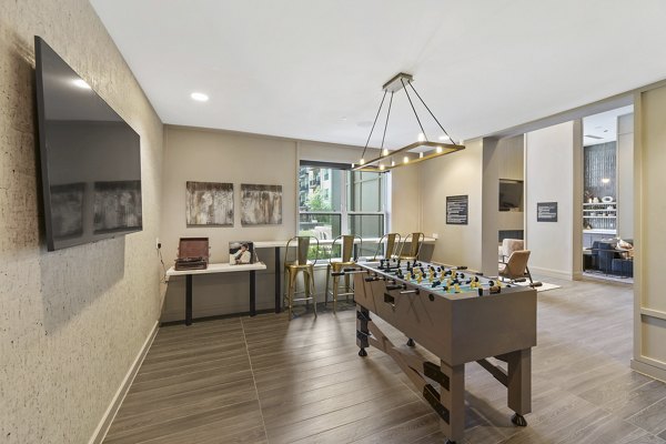 Elegant clubhouse with modern furnishings at The Ian Apartments, a Greystar luxury community