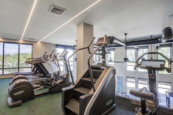Fitness center with modern equipment at The Ian Apartments in luxury Greystar community