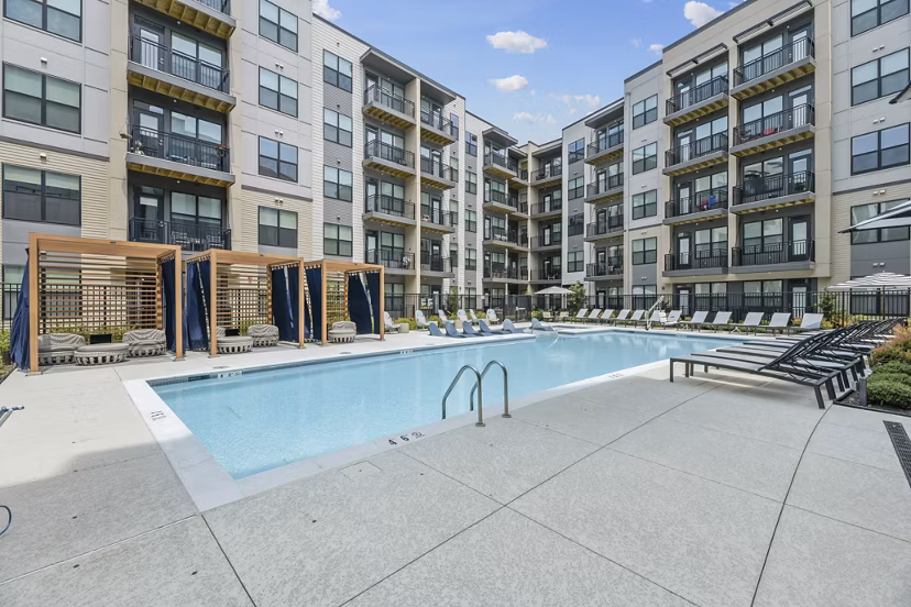 Luxury pool at The Ian Apartments offering relaxing outdoor amenities in a vibrant community
