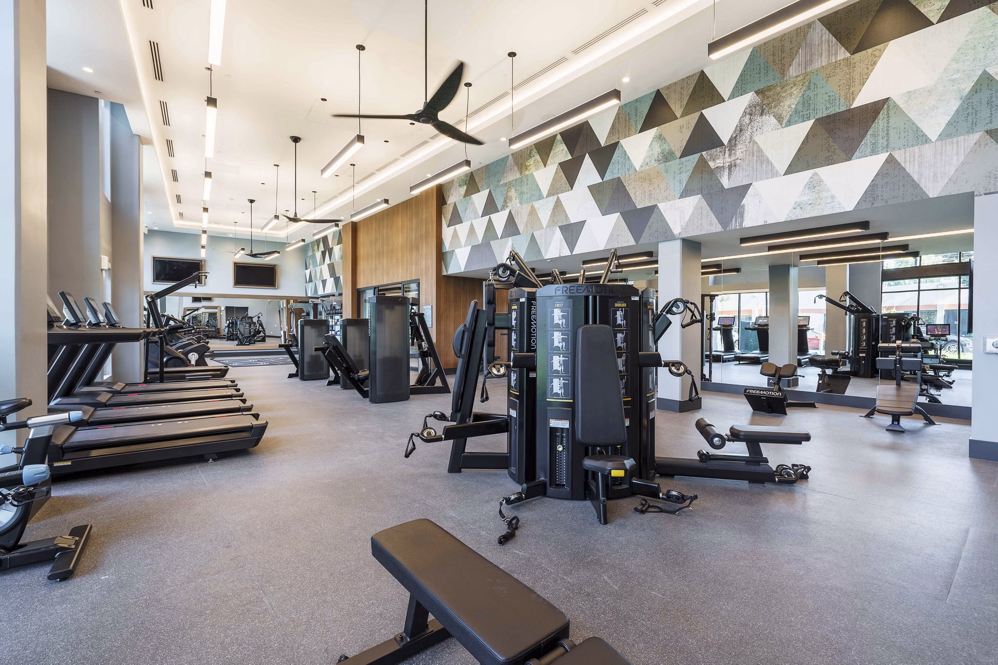 fitness center at One Adrian Apartments