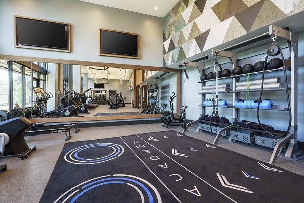 fitness center at One Adrian Apartments