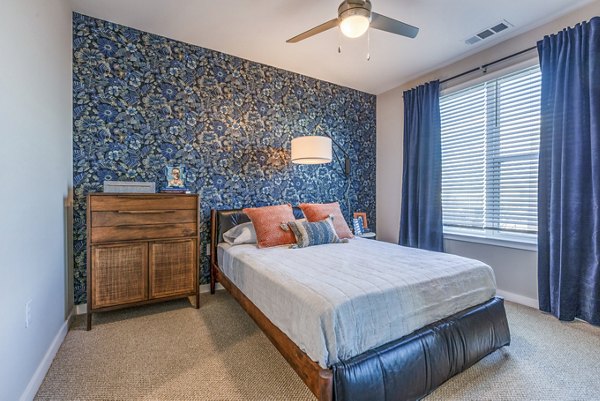 bedroom at TAlexan Mill District Apartments
