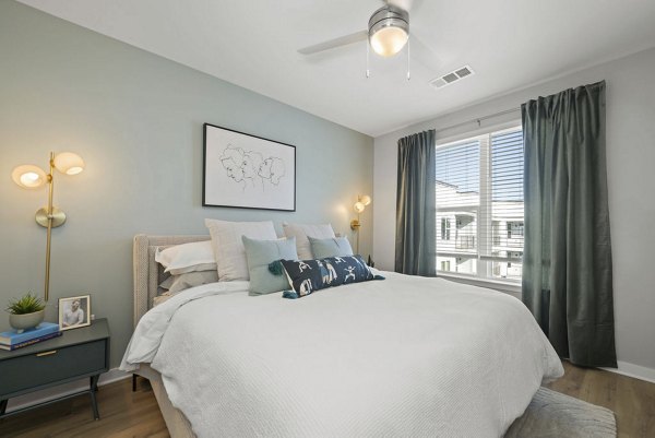 bedroom at TAlexan Mill District Apartments