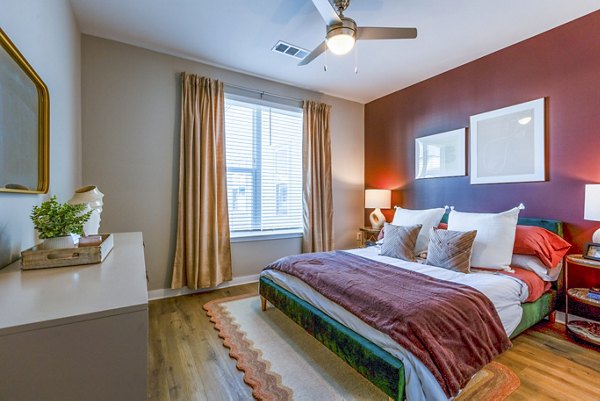 bedroom at TAlexan Mill District Apartments