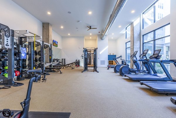 fitness center at Alexan Mill District Apartments