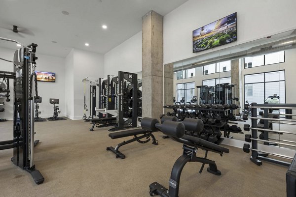 fitness center at Alexan Mill District Apartments 
