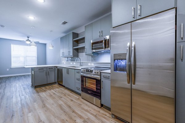 kitchen at Alexan Mill District Apartments