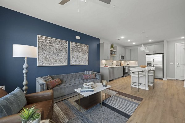 living room at Alexan Mill District Apartments