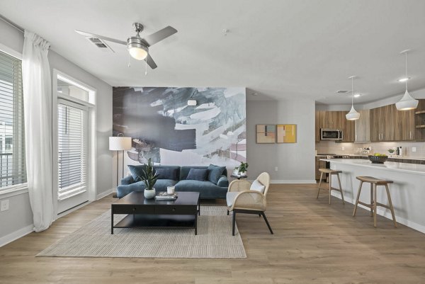 living room at Alexan Mill District Apartments 