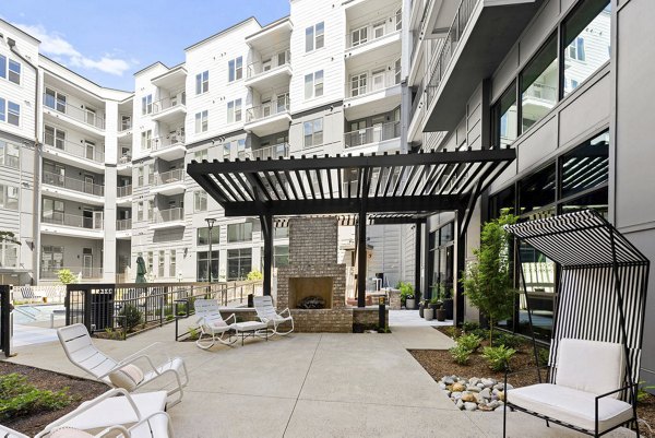 grill area at Alexan Mill District Apartments 