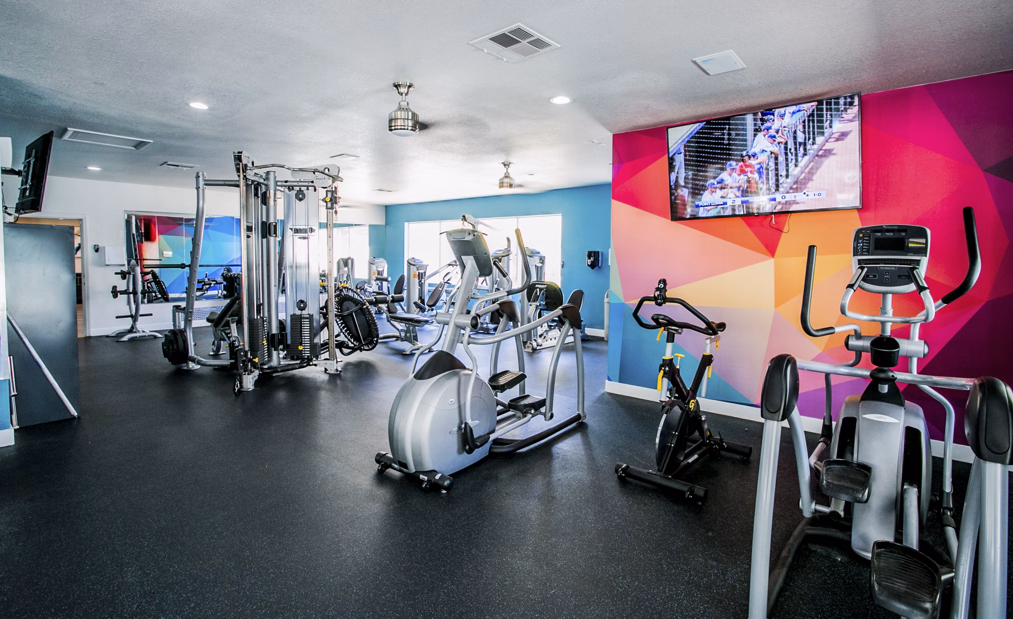 fitness center at The Layne at Peccole Ranch Apartments 