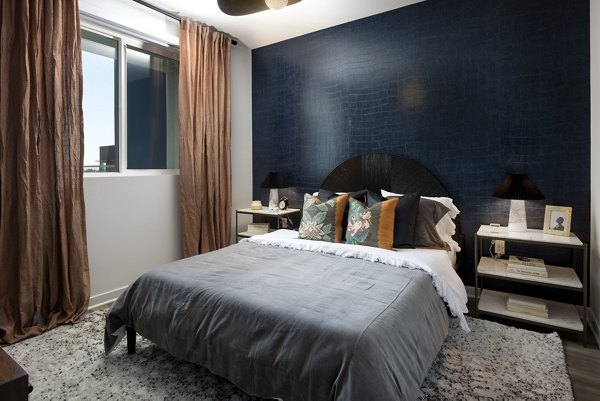 Broadstone Edition Apartments: Modern bedroom with stylish decor and natural light in luxury apartments